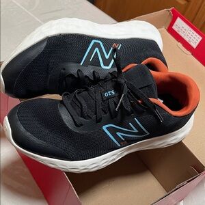 New Balance Kids Black Sneakers with Blue and Orange Accents
